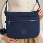 Bandolera mediana Kipling Arto con múltiples bolsillos y correa ajustable