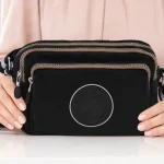 Bolso bandolera Coronel Tapioca para mujer en negro, gran capacidad con 3 cremalleras