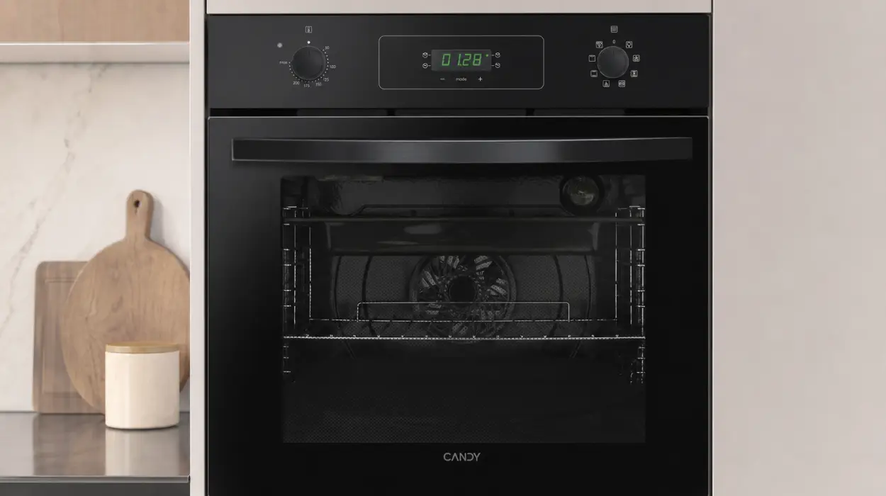 Horno multifunción Candy Idea FIDCP N615 L de 65 l con 8 funciones y limpieza Aquactiva