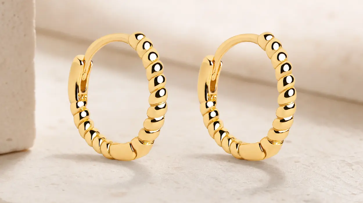 Pendientes Singularu Aro Twist en plata bañada en oro de 18 kt