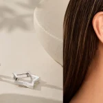 Pendientes estrella en acero inoxidable con cierre click de Singularu para mujer