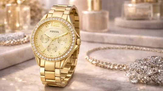 Reloj Fossil Riley dorado y purpurina para mujer