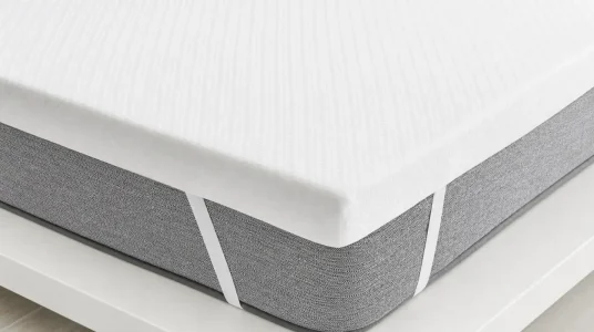 Topper viscoelástico multizonas Pikolin Home de 7 cm para cama de 135, desenfundable y transpirable