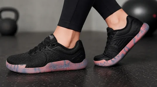 Zapatillas deportivas Reebok Nano Zero para mujer en negro y arena naranja